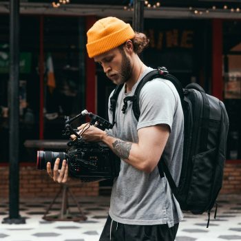content creator with video camera